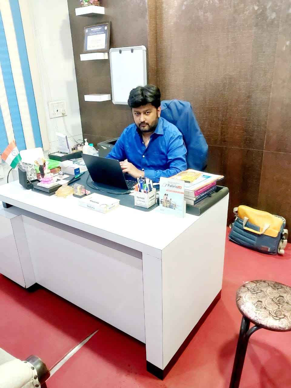 Dr Aditya Soni at his clinic desk